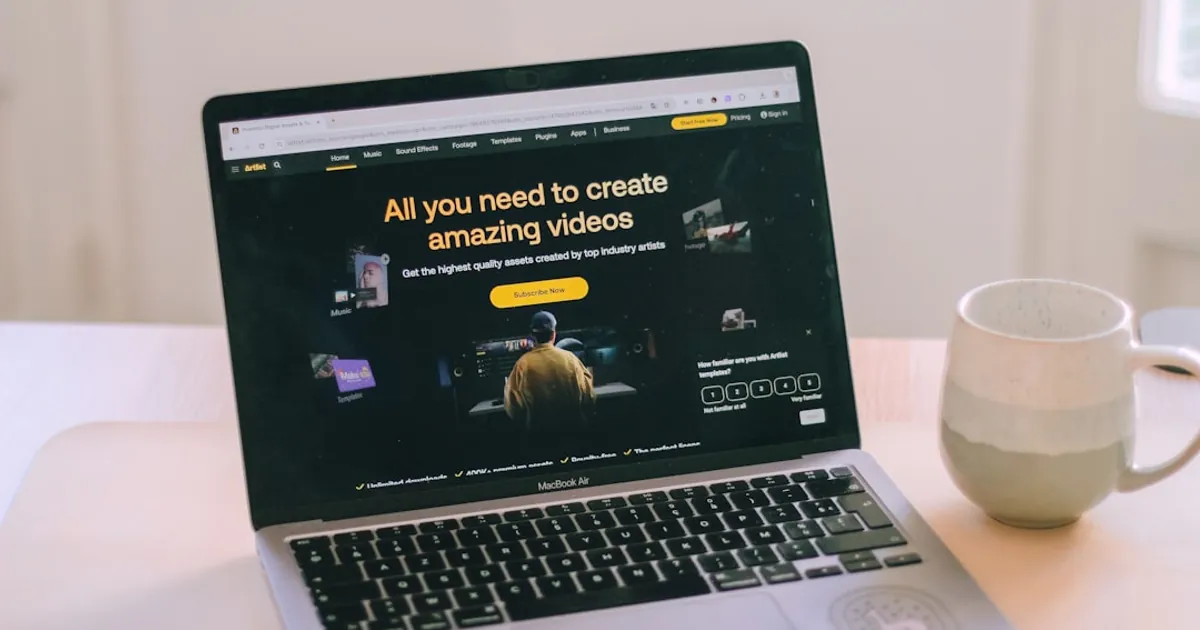 A laptop computer sitting on top of a white table